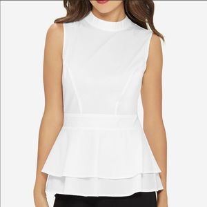 Eva Longoria the limited white peplum top